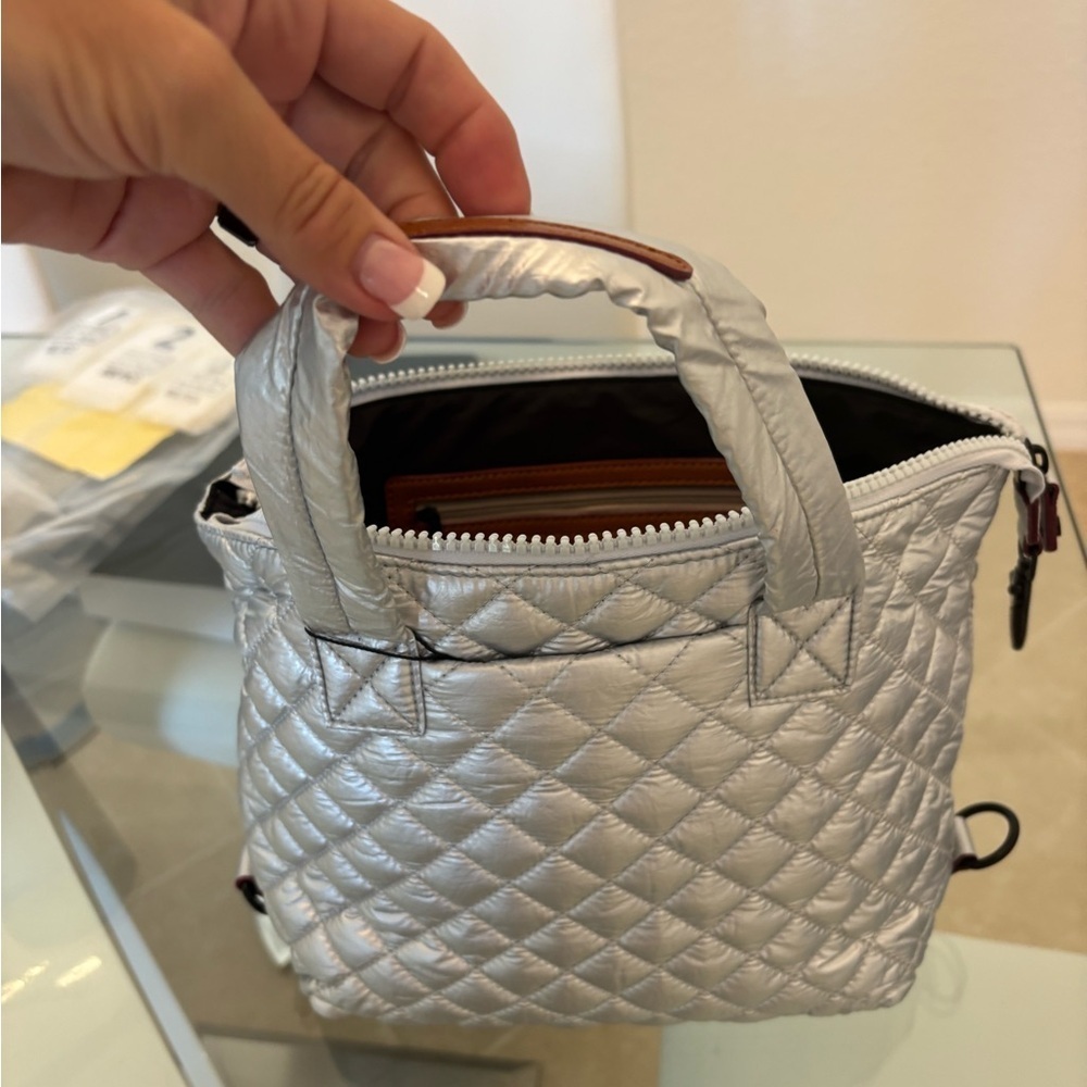 Silver Quilted Women's Handbag with A Strap For Crossbody.